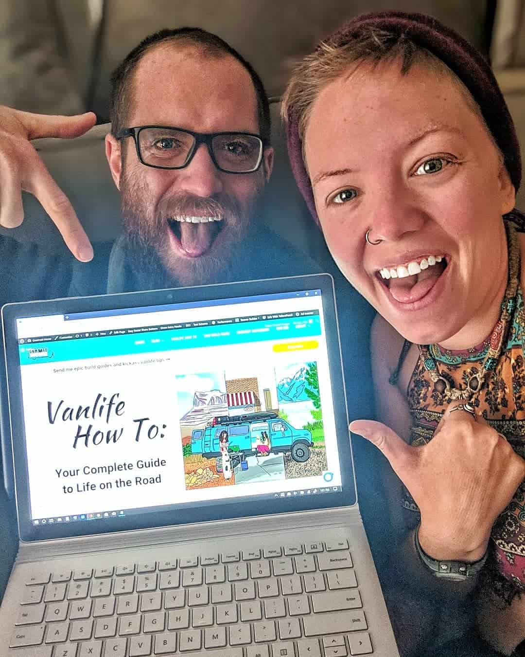 Jayme and John post in their van by their computer, where they educate people about van life