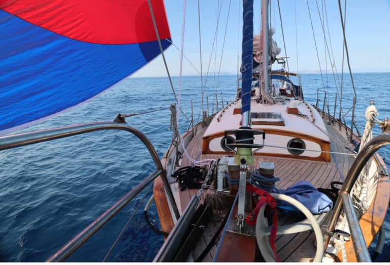 Elena's Tayana 37 in full sail, a small sailboat fit for bluewater cruising