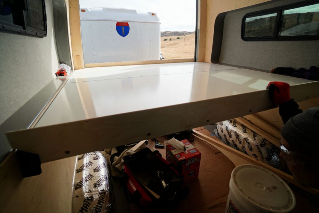 Up close look at a fiddle on a Flarespace bed for a Sprinter van