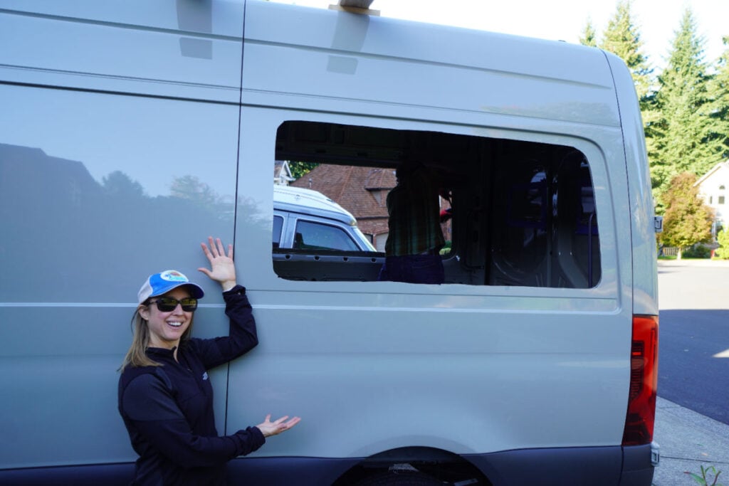 woman standing near sprinter van with hole cut in for Flarespace flare