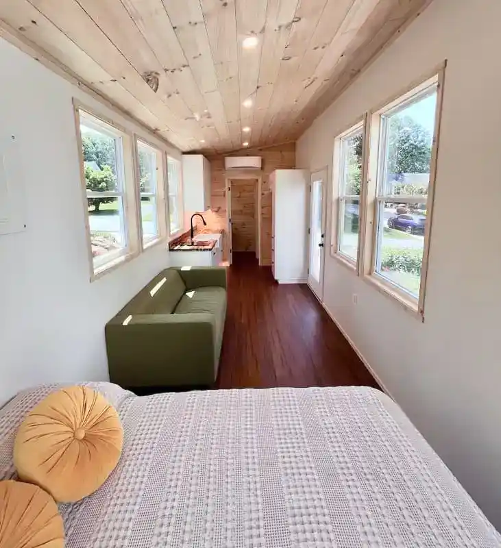 tiny house interior with bed and couch