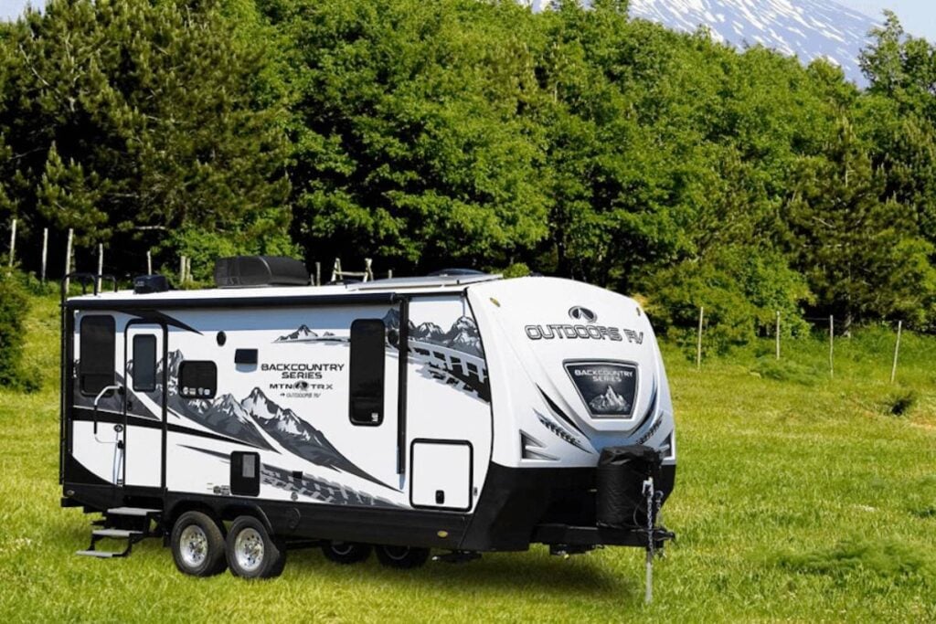 RV trailer parked near the mountain area