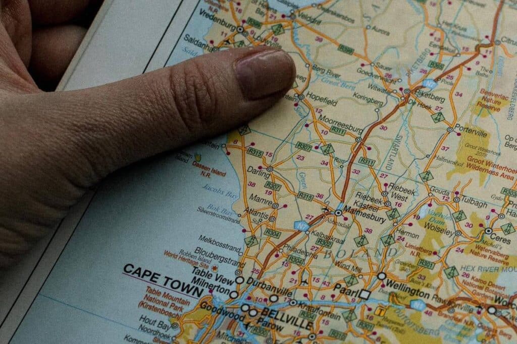 woman holding and reading a map