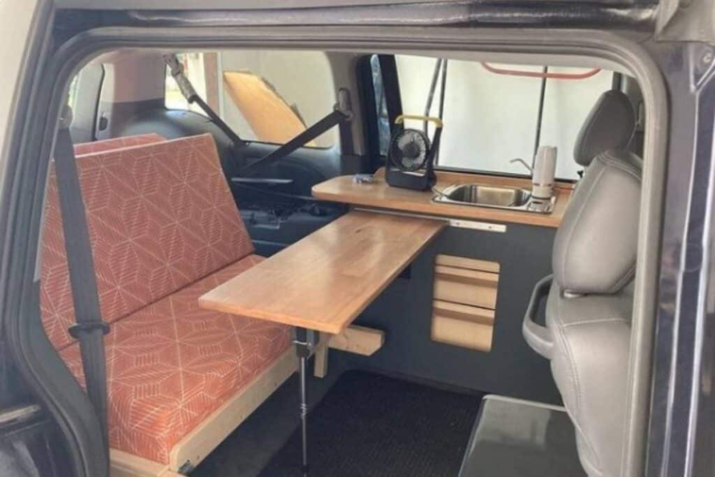 minivan camper showing its dining area