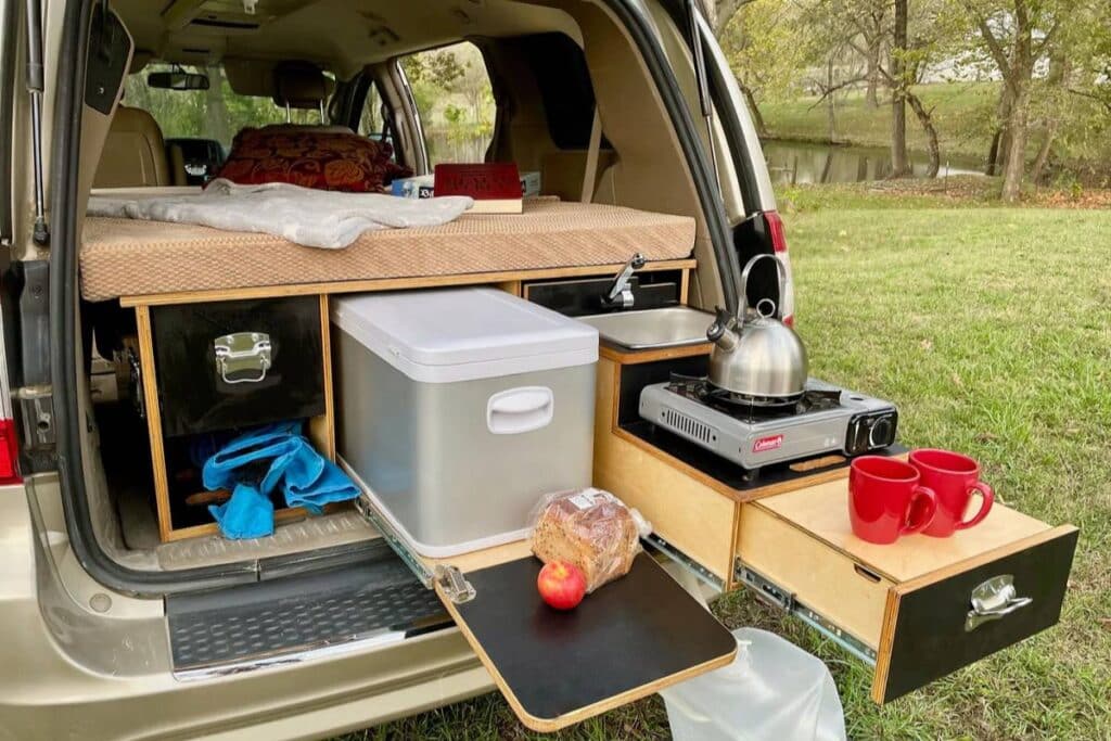 minivan camper showing its kitchen set up by riverleaf campers
