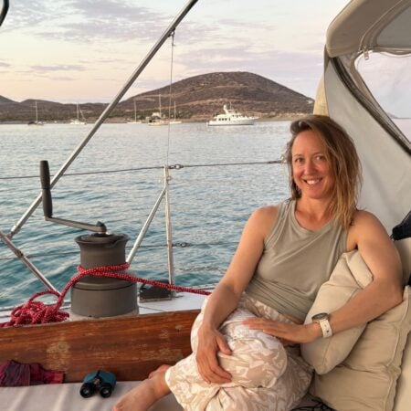 woman on the deck of a sailboat