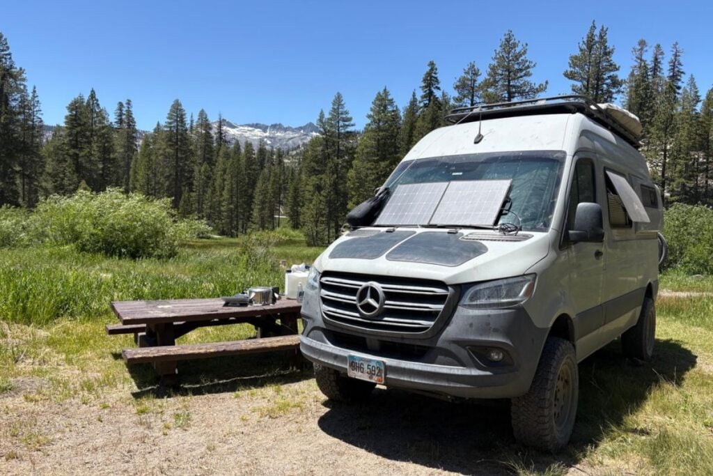 sprinter van parked in a campsite