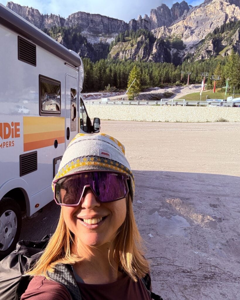 woman standing by Indie camper