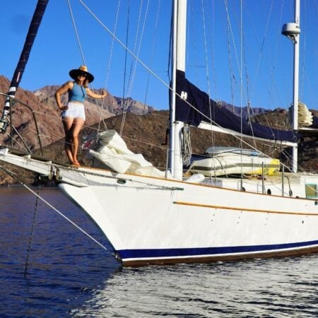 kristin on the bow of a CT 41 sailboat