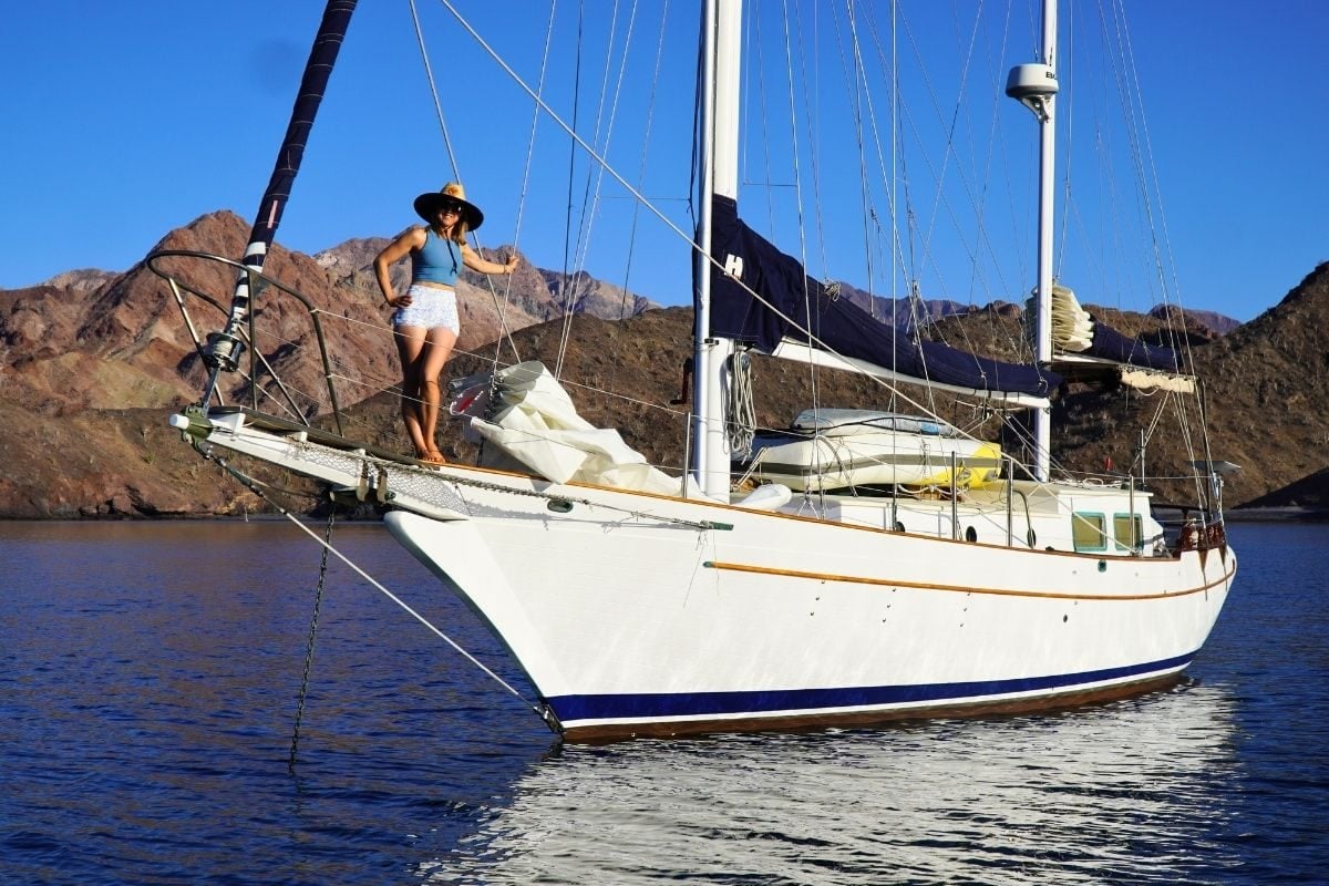kristin on the bow of a CT 41 sailboat