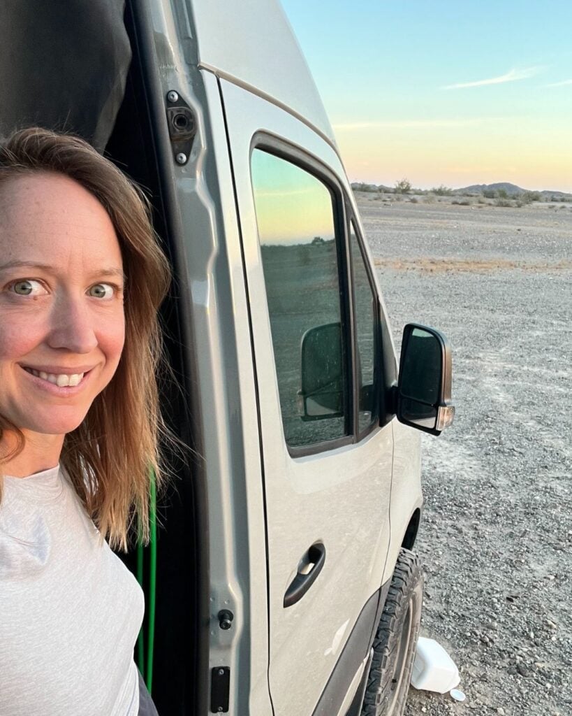 kristin in side door of sprinter van