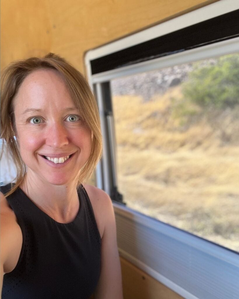 kristin in van sitting by window in the gorge