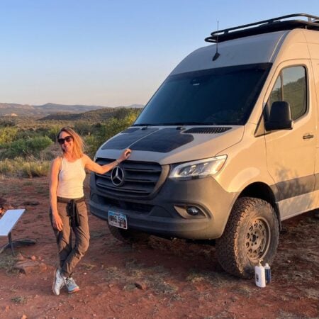 woman by campervan in Sedona