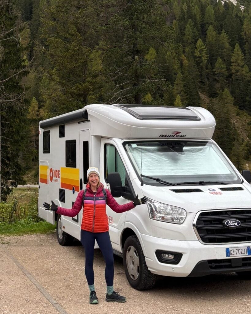 woman standing near camper rental