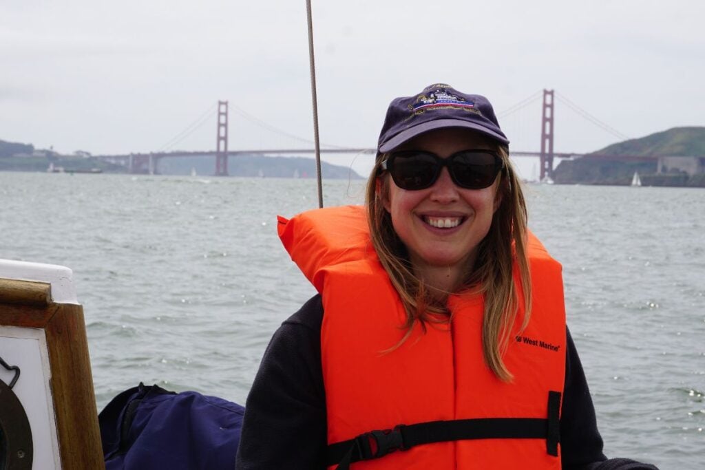 woman with life jacket on boat