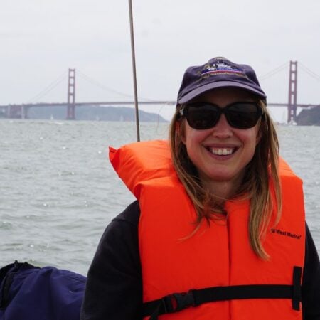 woman with life jacket on boat