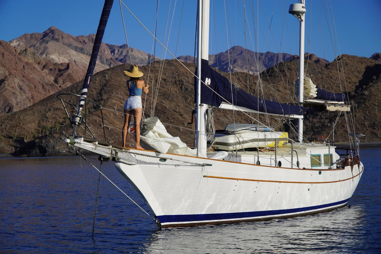 A sailboat anchored in a quiet cove in Baja California, Sea of Cortez