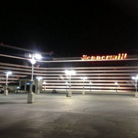 A casino parking lot at night, lit by tall lights, Peppermill Reno